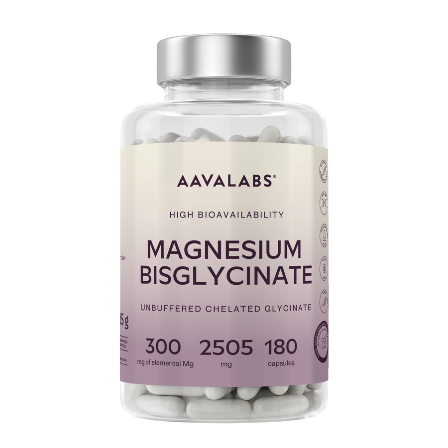 A clear supplement bottle of Aavalabs Magnesium Bisglycinate capsules with a cream and lavender label and a silver cap, shown on a white background.