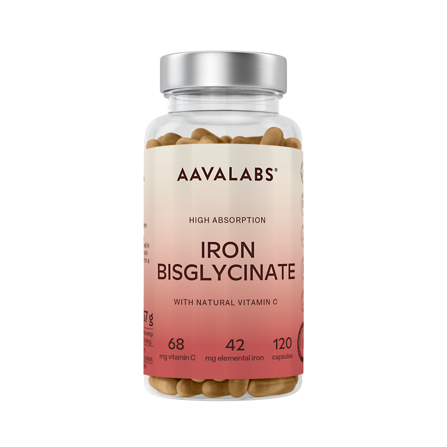 A clear supplement bottle of Aavalabs Iron Bisglycinate capsules with a silver cap and a beige-to-pink label, shown on a plain white background.
