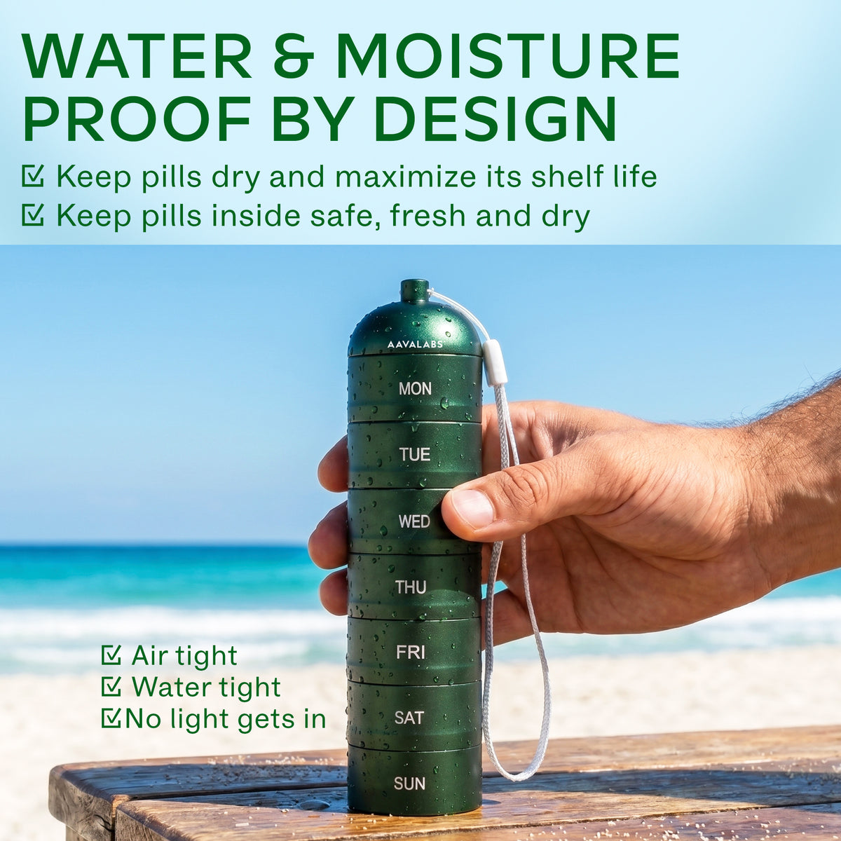 Hand holding a green pill organizer with a beach background, emphasizing water and moisture proof design.