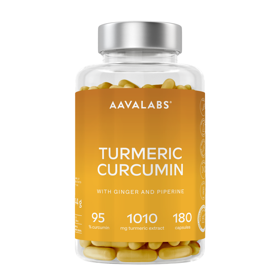 A clear supplement bottle filled with yellow turmeric curcumin capsules, featuring a metallic silver cap and a bright orange label with white text. The brand AAYALABS is clearly visible at the top of the label.